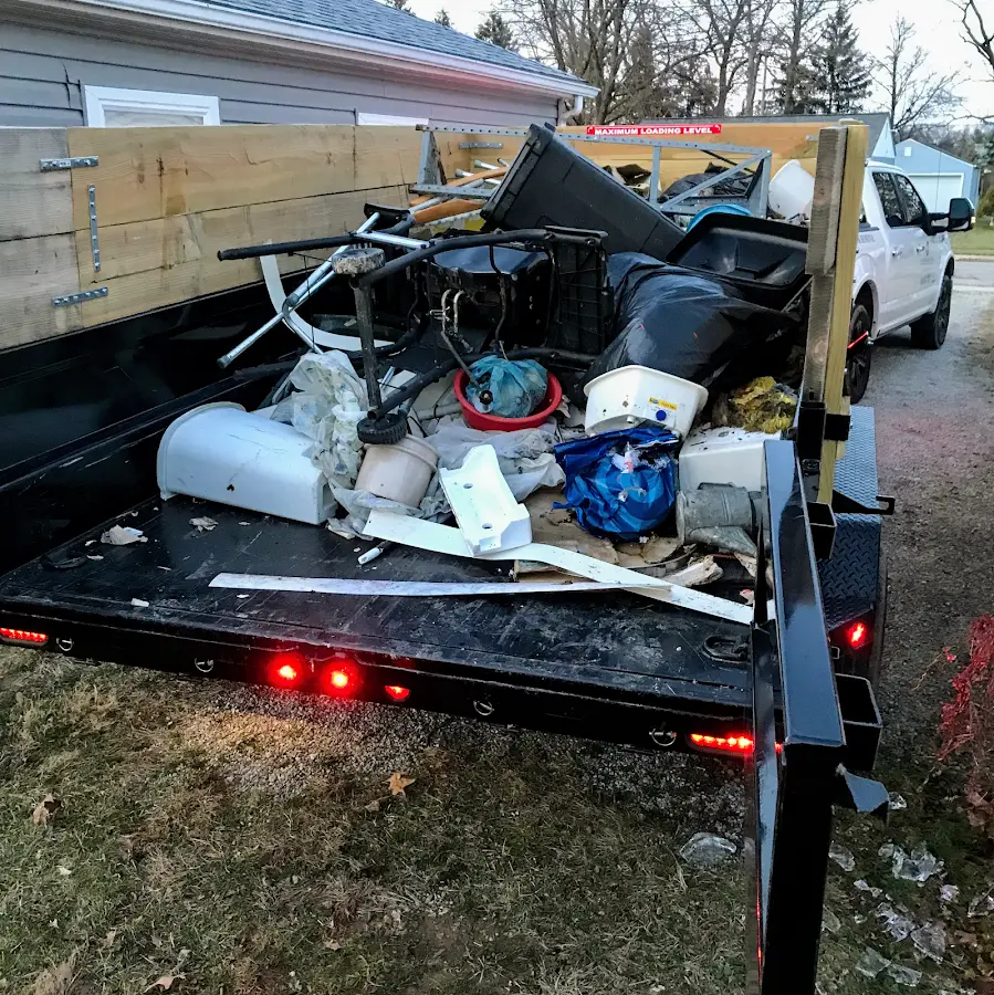 Roll-off dumpster delivered to a residential driveway in Mitchellville