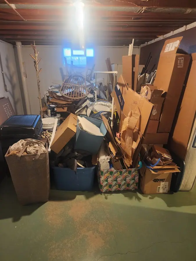 Roll-off dumpster container at job site for 4 Yard Dumpster Rental in Mitchellville